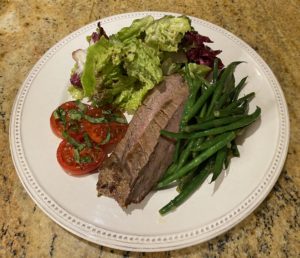 Whole 30 Day 21: Marinated Flank Steak with Sauteed Green Beans, Marinated Tomatoes, and Mixed Greens